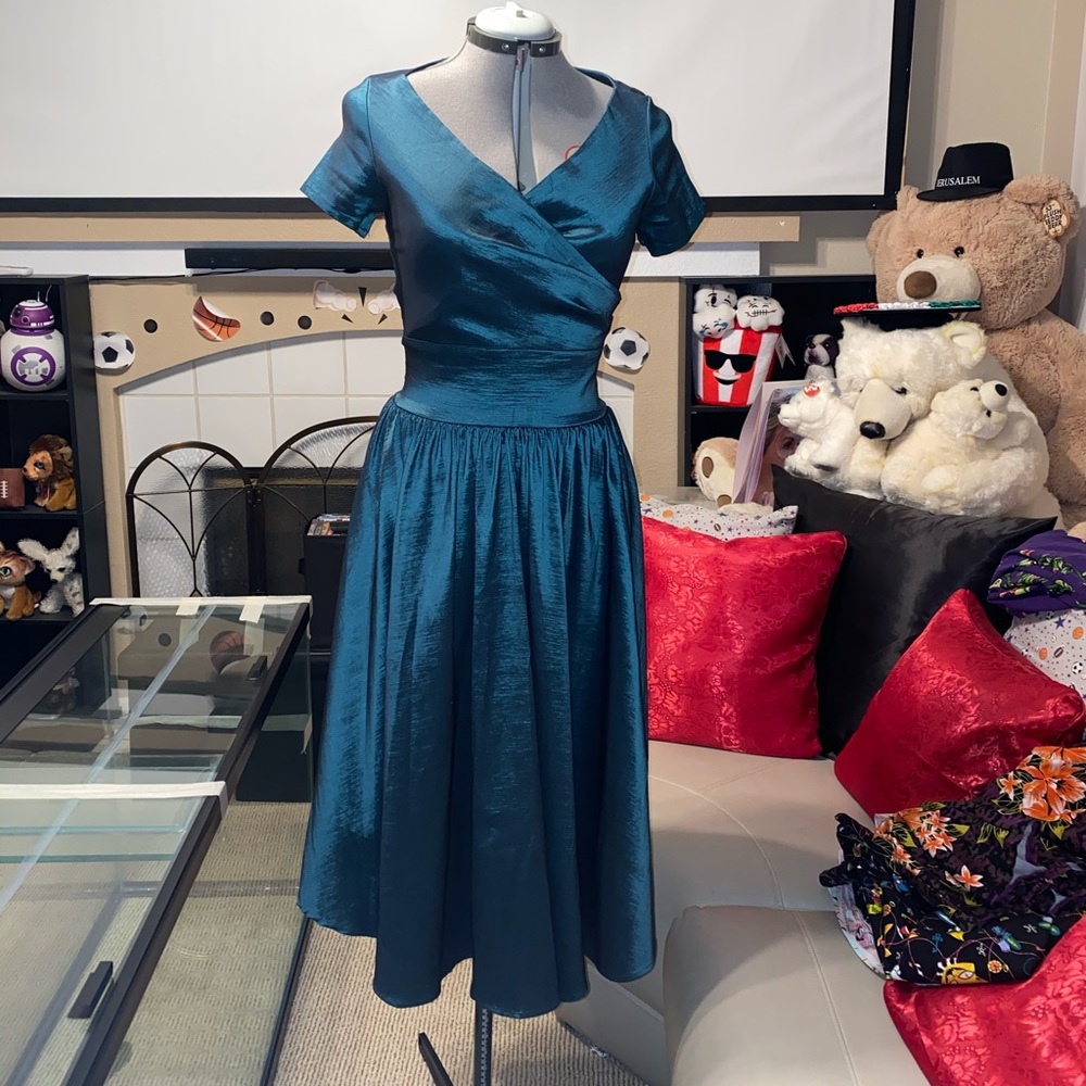 **Sold** Pinup Girl Teal Ava Swing
